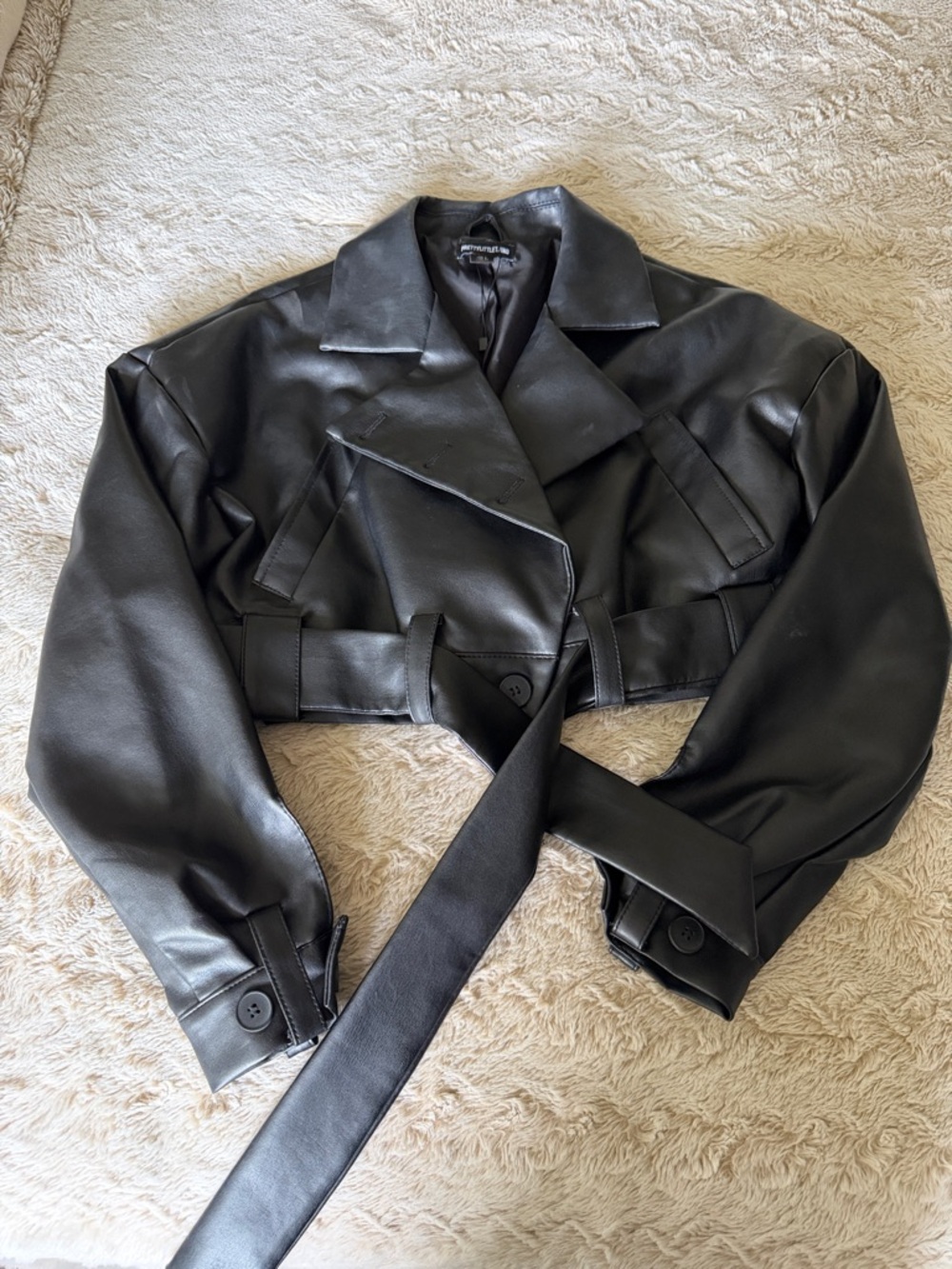 PrettyLittleThing Black Cropped Faux Leather Belted Jacket